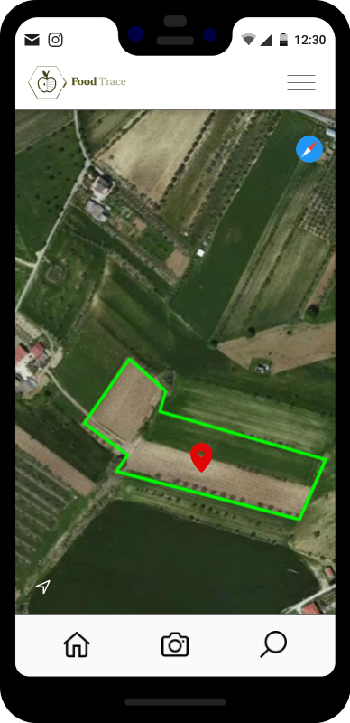 foto di uno smartphone con al centro una foto di un campo agricolo geolocalizzato